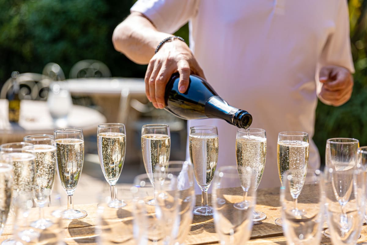 Photo of a table of champagne flutes at a party event at East Horton.