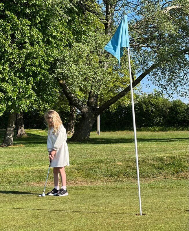 Photo of a child playing golf at East Horton golf club.