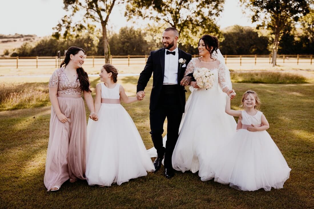 Photo of a bride, groom, and their family at East Horton.