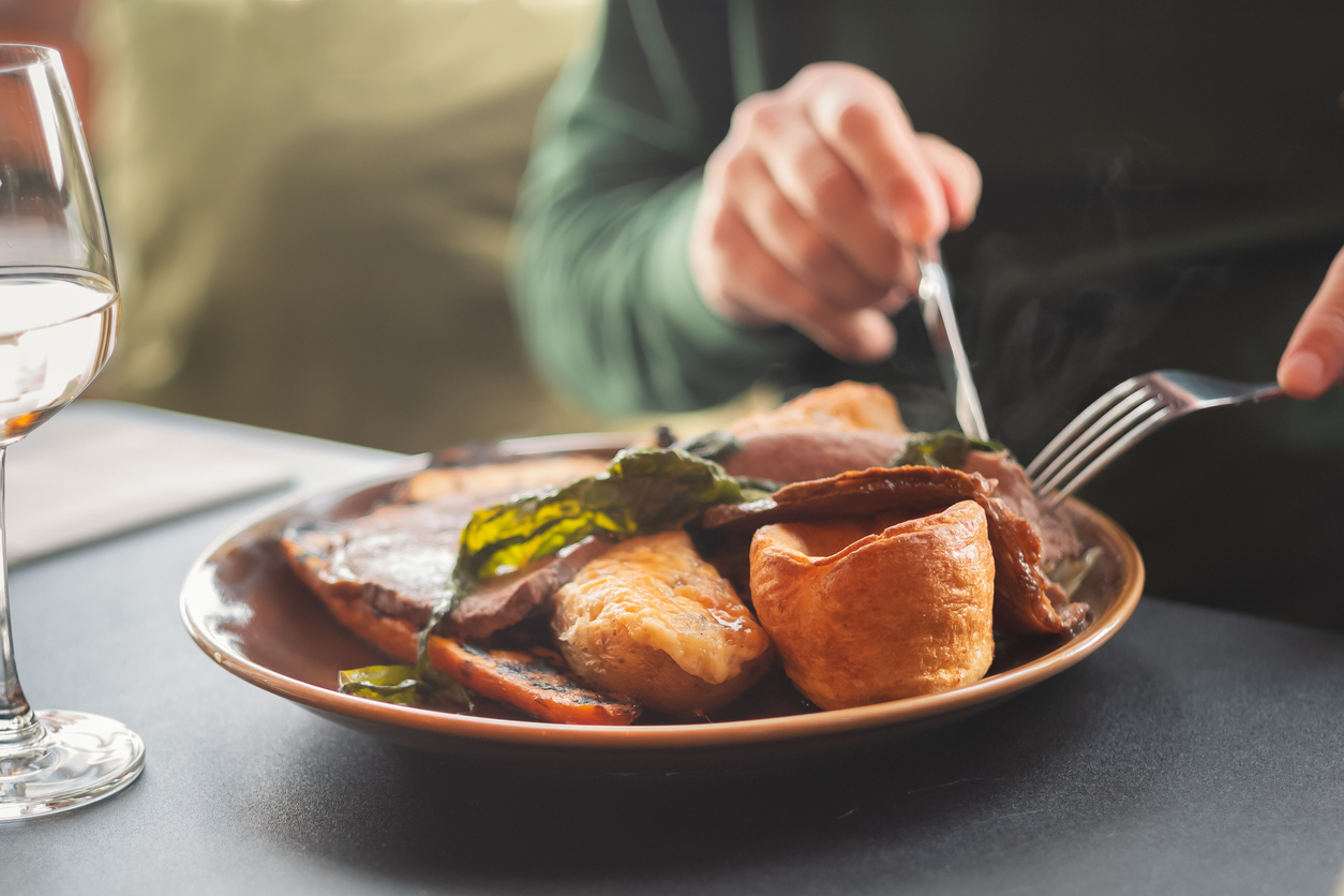 Photo of a person eating a roast dinner at East Horton.