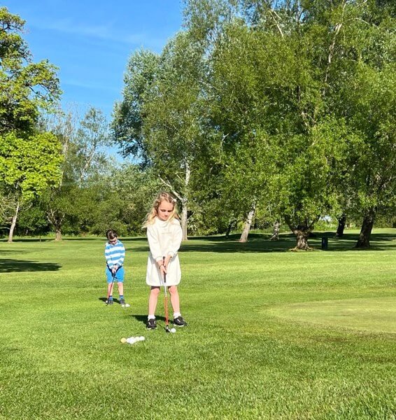 Photo of a child playing golf at East Horton golf club.